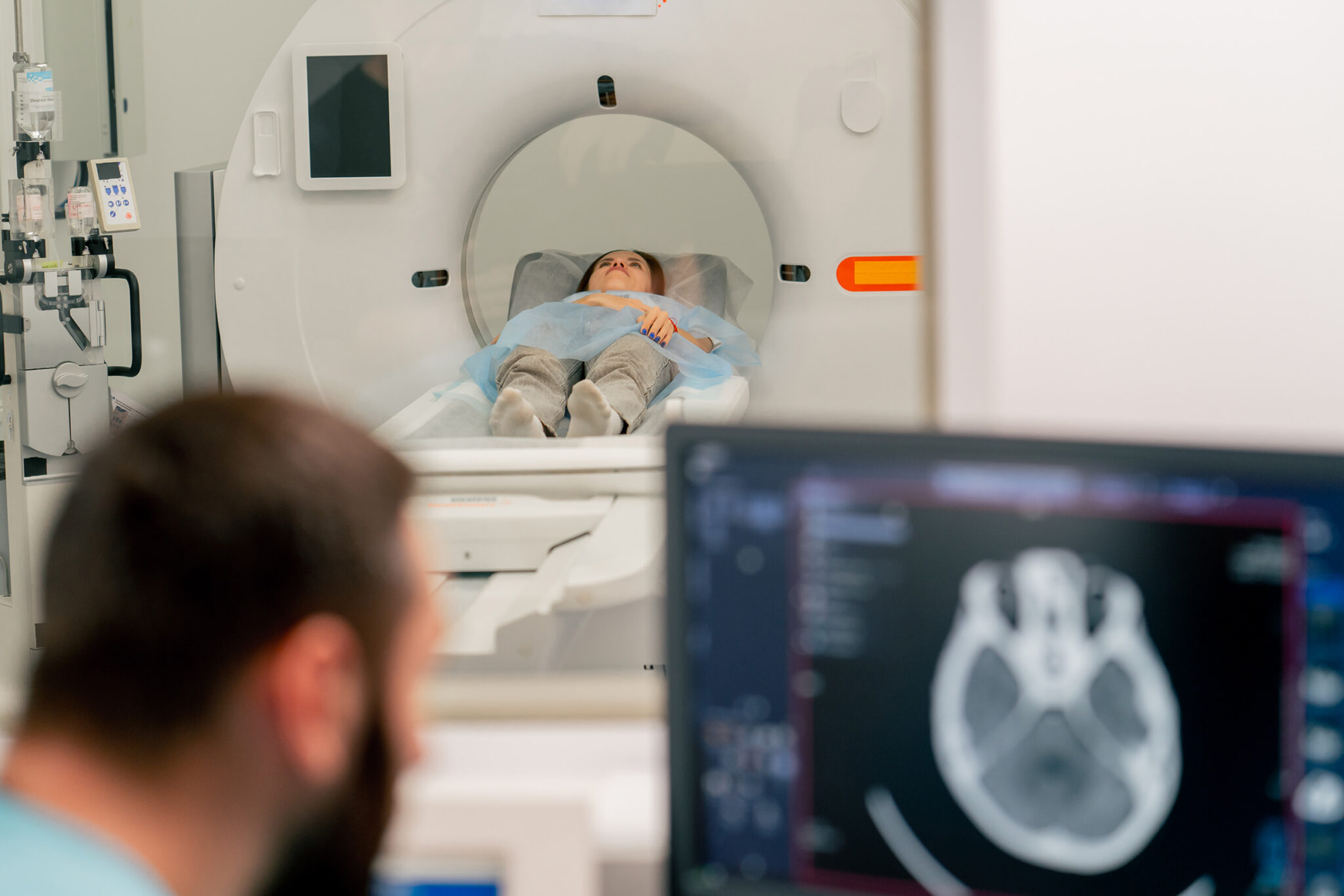 Woman lying in a ct scanner in hospital